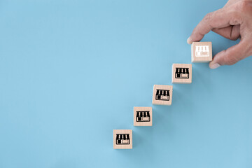 Franchise business concept,hand choose wood blog with franchise marketing.