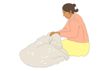 woman sitting with sheep on the ground