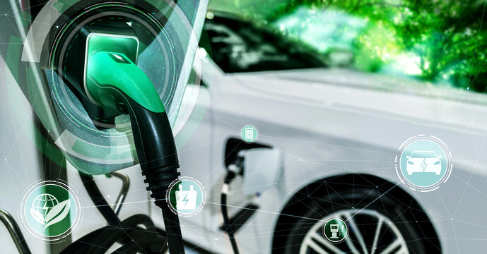 EV charging station for electric car in concept of alternative green energy produced from sustainable resources to supply to charger station in order to reduce CO2 emission .