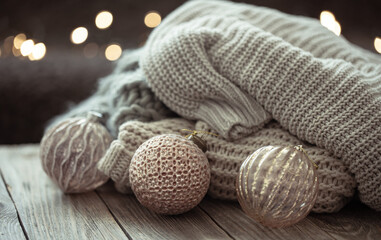 Close-up of Christmas balls on a blurred background with bokeh.