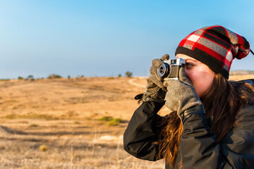 Travel tourist woman photographer taking pictures.