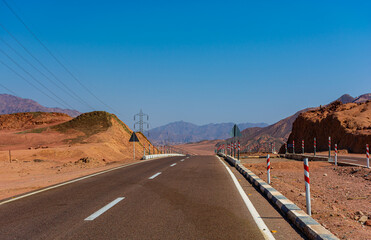 The road among the mountains of the Sinai Peninsula on a hot summer day