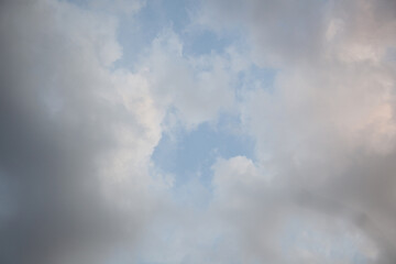 gray clouds against the background of the morning blue  sky, dawn.