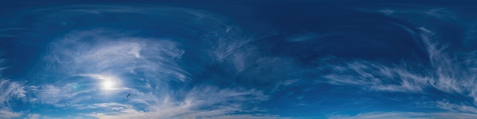 Blue sky panorama with Cirrus clouds. Seamless hdr 360 degree pano in spherical equirectangular format. Complete zenith for 3D visualization, game and sky replacement for aerial drone 360 panoramas.