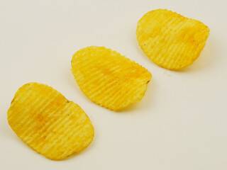 potato chips isolated on black