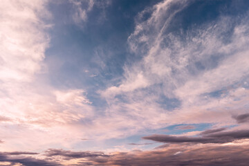 Naklejka na ściany i meble bright dramatic twilight sky, beautiful clouds at dawn