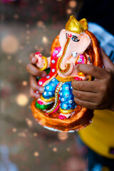 eco friendly Ganesha idol or statue, home made. selective focus