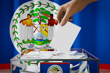 Belize flag, hand dropping ballot card into a box - voting, election concept - 3D illustration
