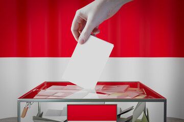 Monaco flag, hand dropping ballot card into a box - voting, election concept - 3D illustration