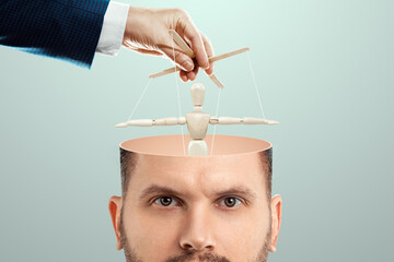 In the man's head, instead of a brain, a puppet is a doll. The concept of addiction, slave,...