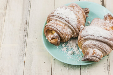 Croissant on plate in the restaurant