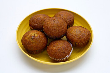 Banana Cupcakes in  plate on white background.