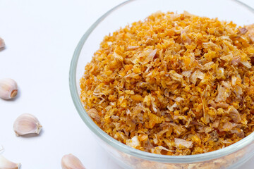 Fried chopped garlic on white background.