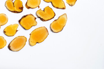 Fototapeta na wymiar Phlai slices, Cassumumr ginger or zingiber montanum on white background.