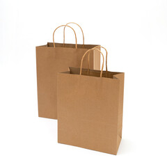 recycled paper shopping bags on white