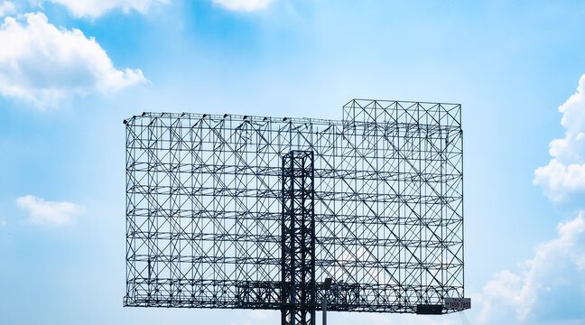 Steel structure billboard. Against blue sky