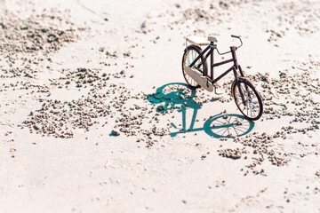 wooden  bicycle toy handicraft  at the beach o beautiful  nature background