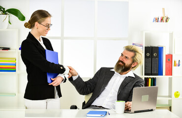 Build career. Office secretary. Business couple working. Couple in office. Distribute obligations...