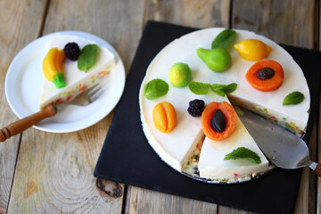 Delicious cream cheesecake with fruits. Healthy summer dessert.  White fruit cake.