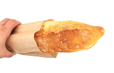 Freshly baked baguette in a paper package