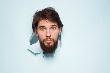 emotional man breaks through the background fun isolated background