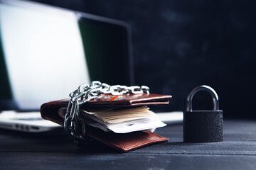 chain wallet with lock and laptop © Artvibe