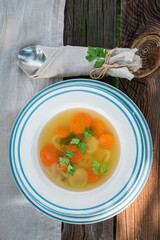 Homemade broth served in the garden. Dinner in garden.