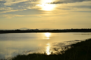 Obraz premium sunset over the river