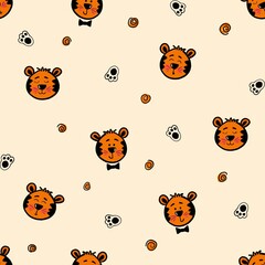 Naklejka premium Seamless pattern with cute tiger cubs. Design for children's clothing, fabrics and other items. The illustration is hand-drawn with live lines in the kartun style.