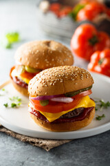 Traditional homemade cheeseburgers on a plate
