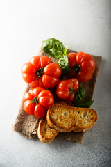 Ripe tomatoes with toasted bread