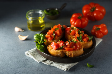 Traditional homemade bruschetta with tomato and basil