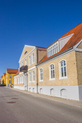 Street with historic houses in the center of Christiansfeld, Denmark