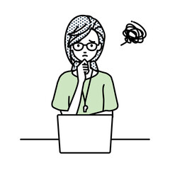 デスクで座ってPCを開いて困っている教師の女性
