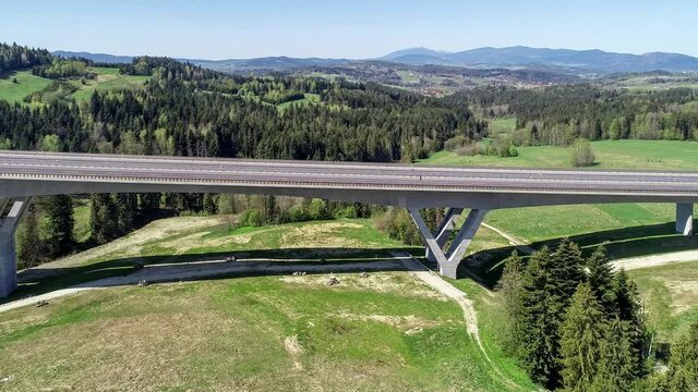 New highway in Poland on national road no 7, E77, called Zakopianka near  Skomielna  Biała village. Aerial 4K panning video