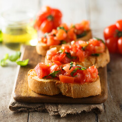 Traditional homemade bruschetta with tomato and basil