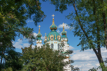 Domes of St. Andrew's Church in Kiev on a summer sunny day