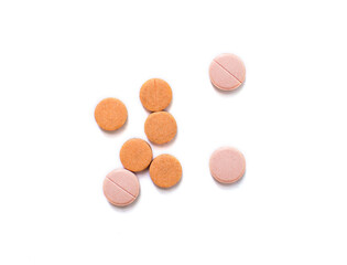 Pills. Multi-colored pills on an isolated white background. Healthcare and medicine.