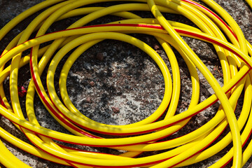 Yellow garden hose for water supply
