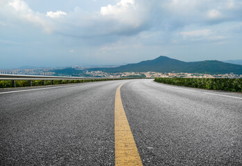 Outdoor highway curve and city view