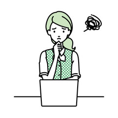 デスクで座ってPCを開いて困っている事務員制服の女性