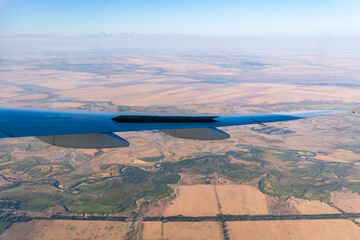 Aircraft wing over Kyrgyzstan near Bishkek