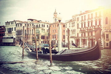 Gondola moored in channel in Venice, Italy
