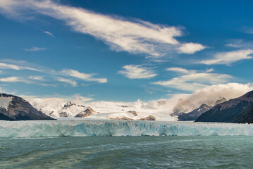 Perito Moreno Glacier, Santa Cruz, Argentina. A beautiful day with some clouds in the sky