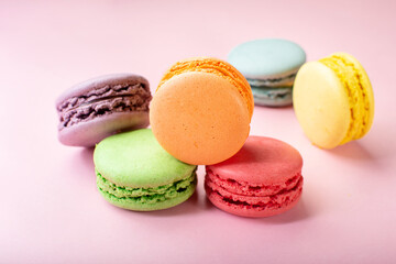 French macaroni. the most delicate cake is a cookie made of two smooth halves, fastened with stringy fillings.French pastry made from egg whites. French macaroni in different colors.