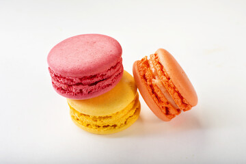 French macaroni. the most delicate cake is a cookie made of two smooth halves, fastened with stringy fillings.French pastry made from egg whites. French macaroni in different colors.