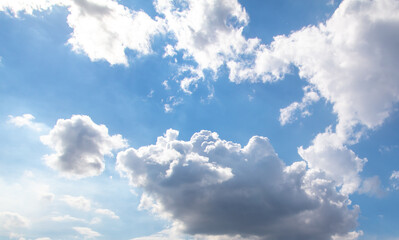 Obraz na płótnie Canvas White clouds on a blue sky