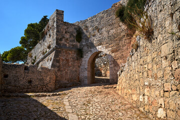 Fototapeta na wymiar Stone gate of the medieval Venetian St George's castle on the island of Kefalonia