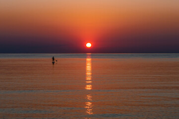 Fototapeta na wymiar Sunrise Padel surf Mediterranean Sea Hd Mallorca Balearic Islands