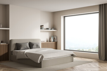 Corner view of a modern beige bedroom